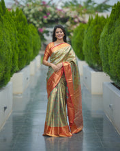Load image into Gallery viewer, Admirable Function Wear Jacquard Zari Weaving Work Kanjivaram Silk Saree With Ephemeral Blouse Piece