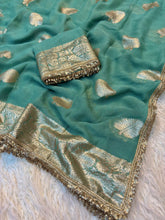 Load image into Gallery viewer, Captivating Wedding Wear Viscose Georgette Jacquard Zari Work Lace Border Designer Saree