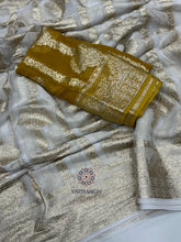 Load image into Gallery viewer, New Festive Wear White n Gold Zari Weaving Viscose Georgette Fancy Designer Saree With Blouse