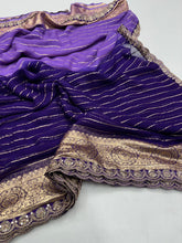 Load image into Gallery viewer, Graceful Wedding Wear Purple Pedding Color Viscose Georgette Jacquard Weaving Work Lace Border Designer Saree