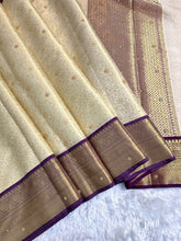 Load image into Gallery viewer, Charming Wedding Wear Light Cream Colour Banarasi Tissue Silk Handstone Work Stunning Pallu n Jacquard Border Saree