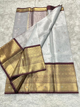 Load image into Gallery viewer, Luxuriant Wedding Wear Silver Colour Banarasi Tissue Silk Handstone Work Stunning Pallu n Jacquard Border Saree