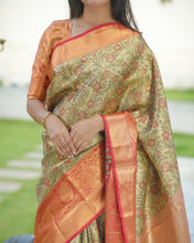 Load image into Gallery viewer, Admirable Function Wear Jacquard Zari Weaving Work Kanjivaram Silk Saree With Ephemeral Blouse Piece
