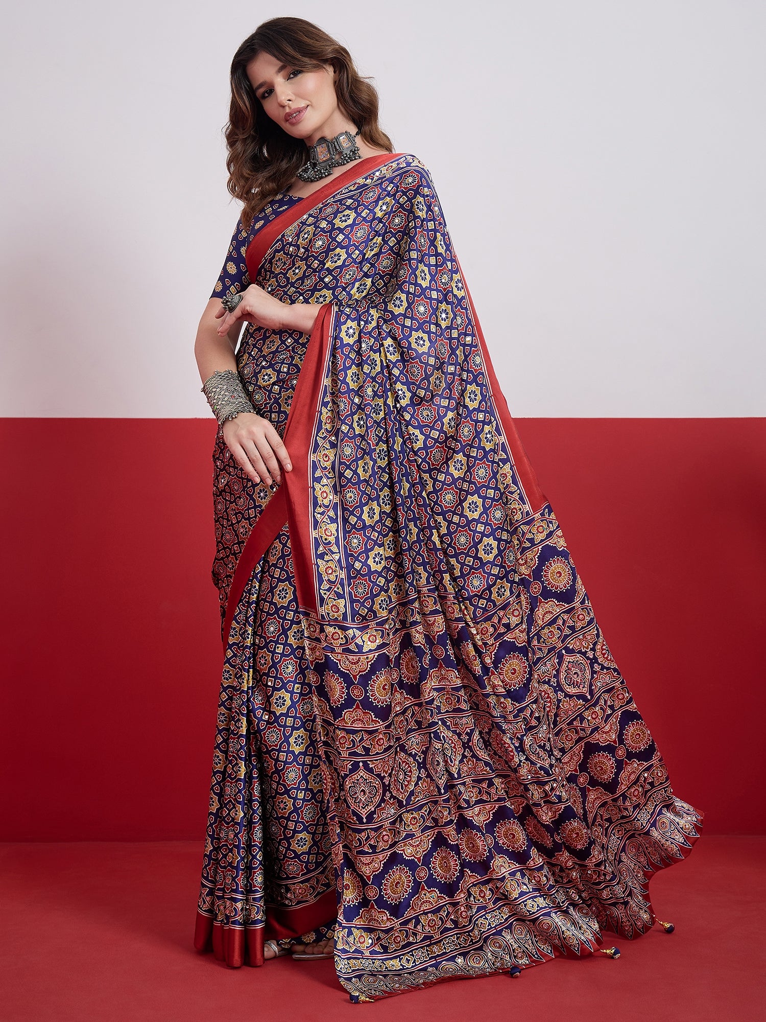 Impressive Party Wear Satin Silk Ajrak Print Mirror Work Designer Saree With Unstitched Blouse Piece
