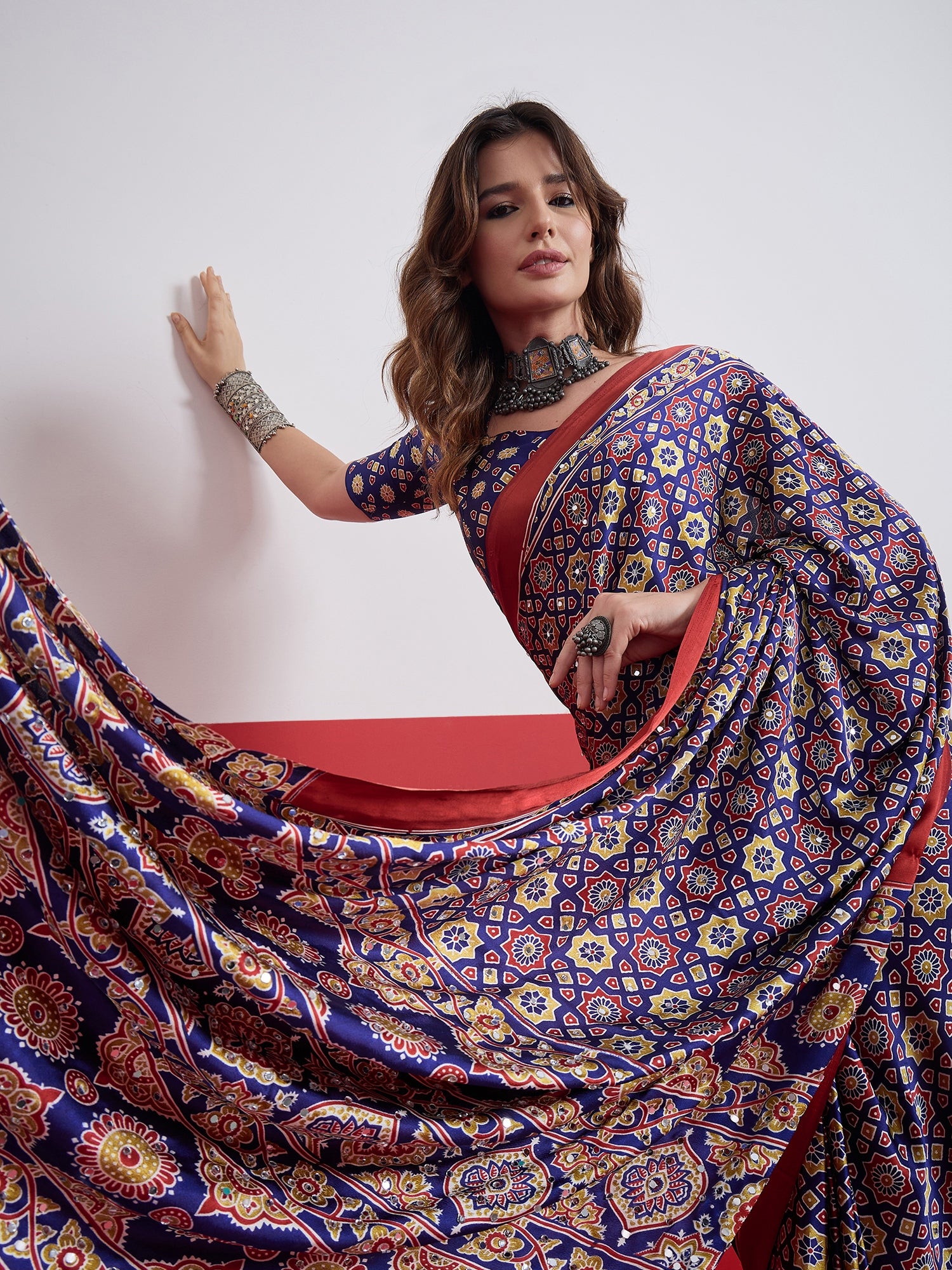 Impressive Party Wear Satin Silk Ajrak Print Mirror Work Designer Saree With Unstitched Blouse Piece
