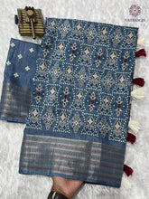 Load image into Gallery viewer, Gorgeous Party Wear Muslin Cotton Ajrakh Print Zari Jacquard Border Tussel Work Fancy Designer Saree
