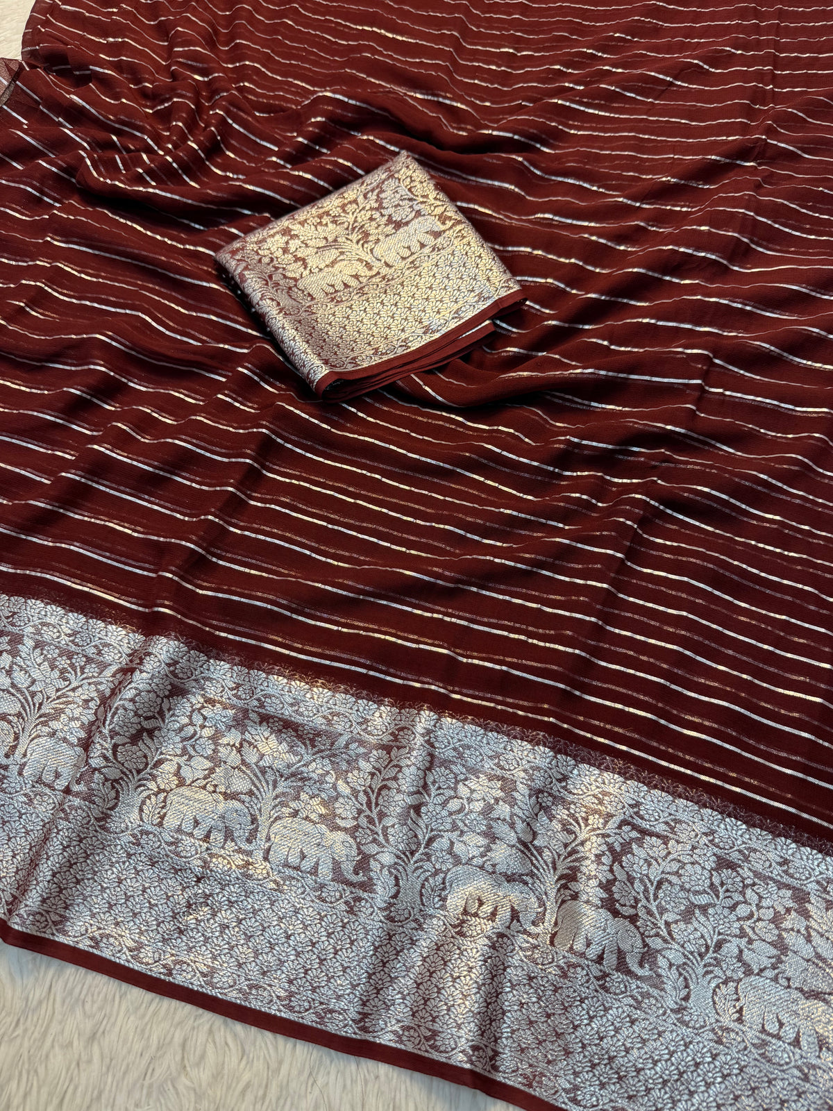 Forbearance Festive Wear Viscose Georgette Jacquard Zari Weaving Work Fancy Saree With Blouse Piece