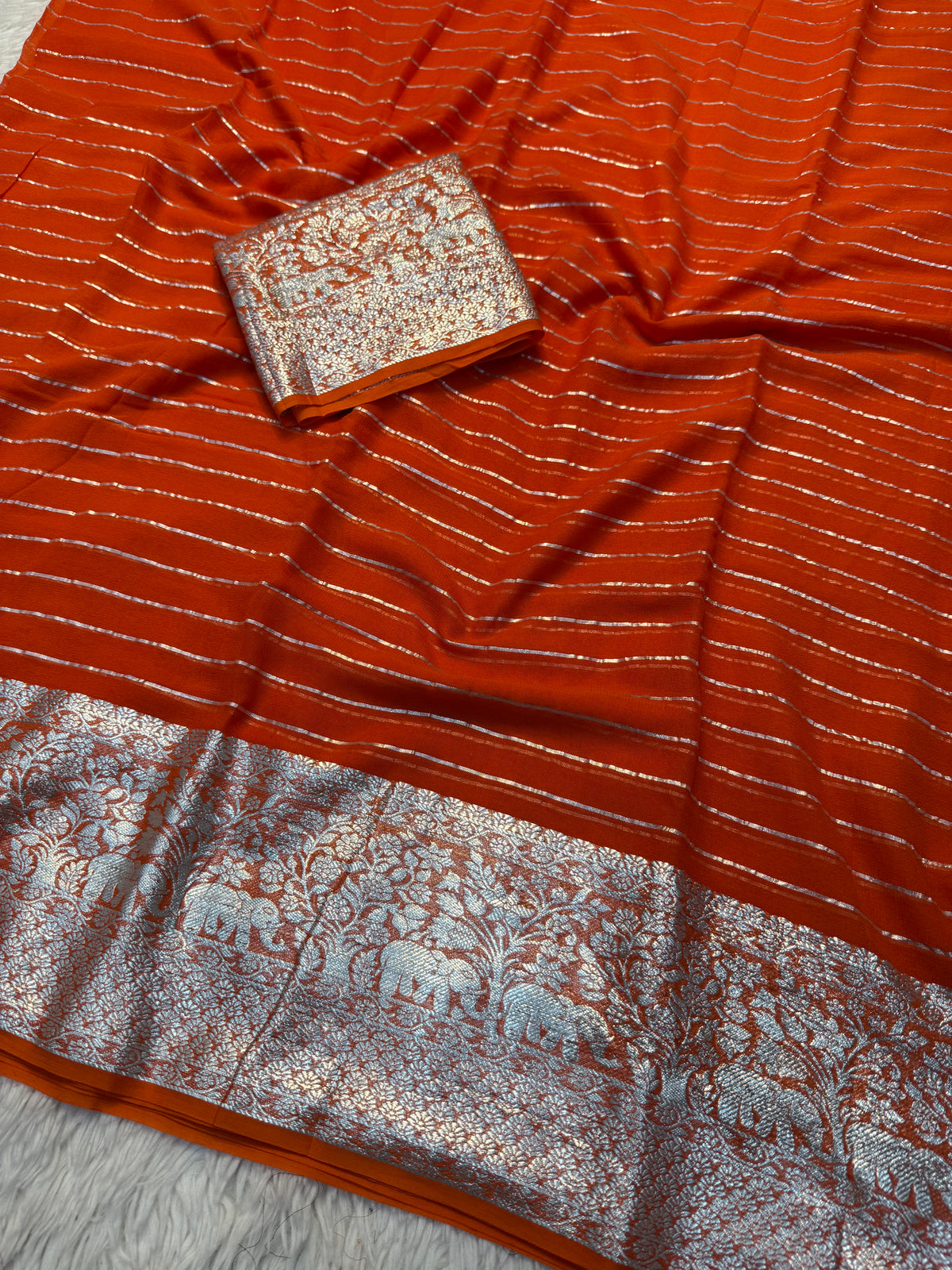 Forbearance Festive Wear Viscose Georgette Jacquard Zari Weaving Work Fancy Saree With Blouse Piece