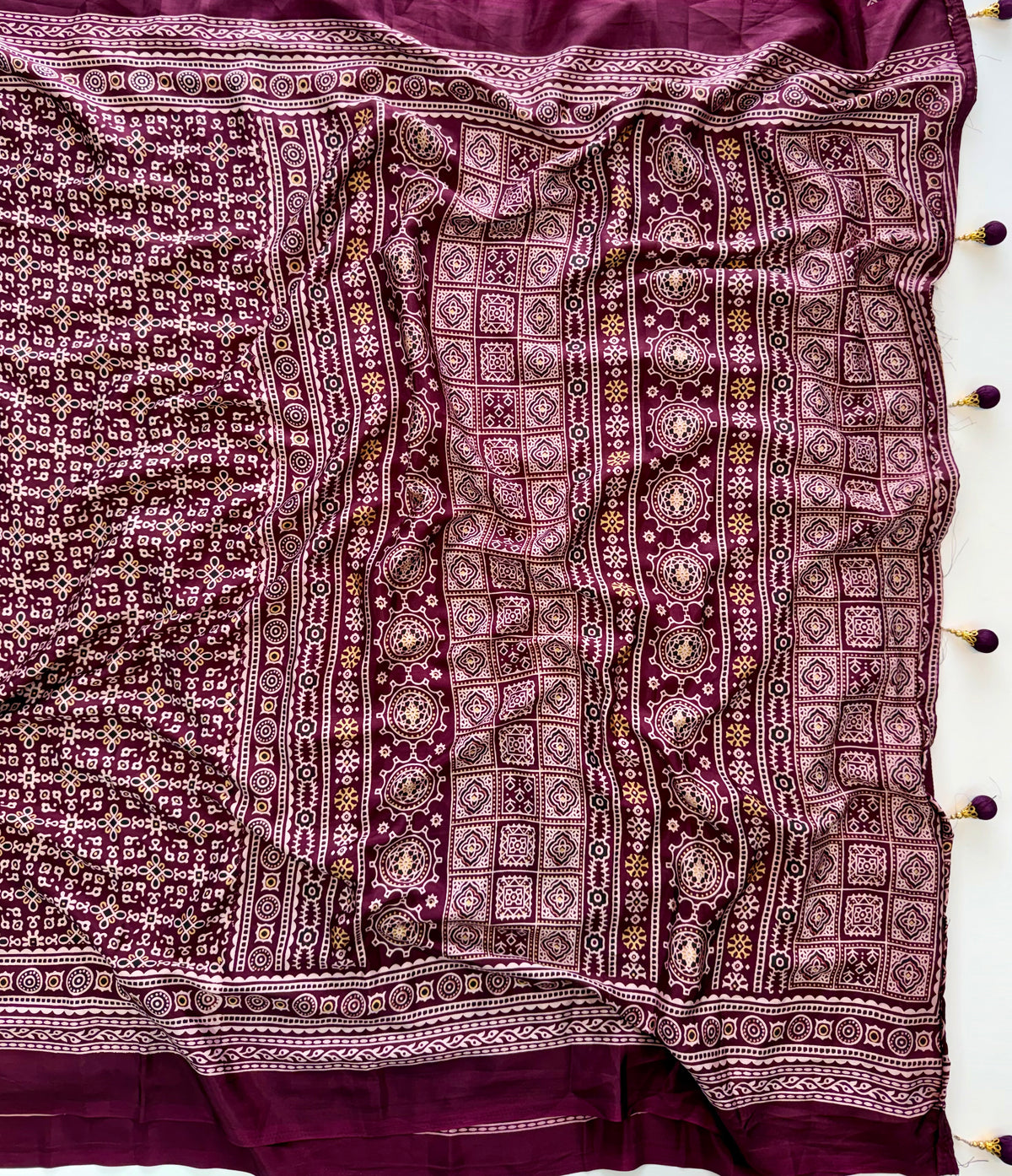 Dazzling Party Wear Crape Silk Ajrak Printed Tussel Work Fancy Saree With Blissful Blouse Piece