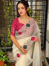 Load image into Gallery viewer, Glamorous Festive Wear Crystal Tissue Zari Embroiderey Hand Applique Work Fancy Designer Saree With Unstitched Blouse
