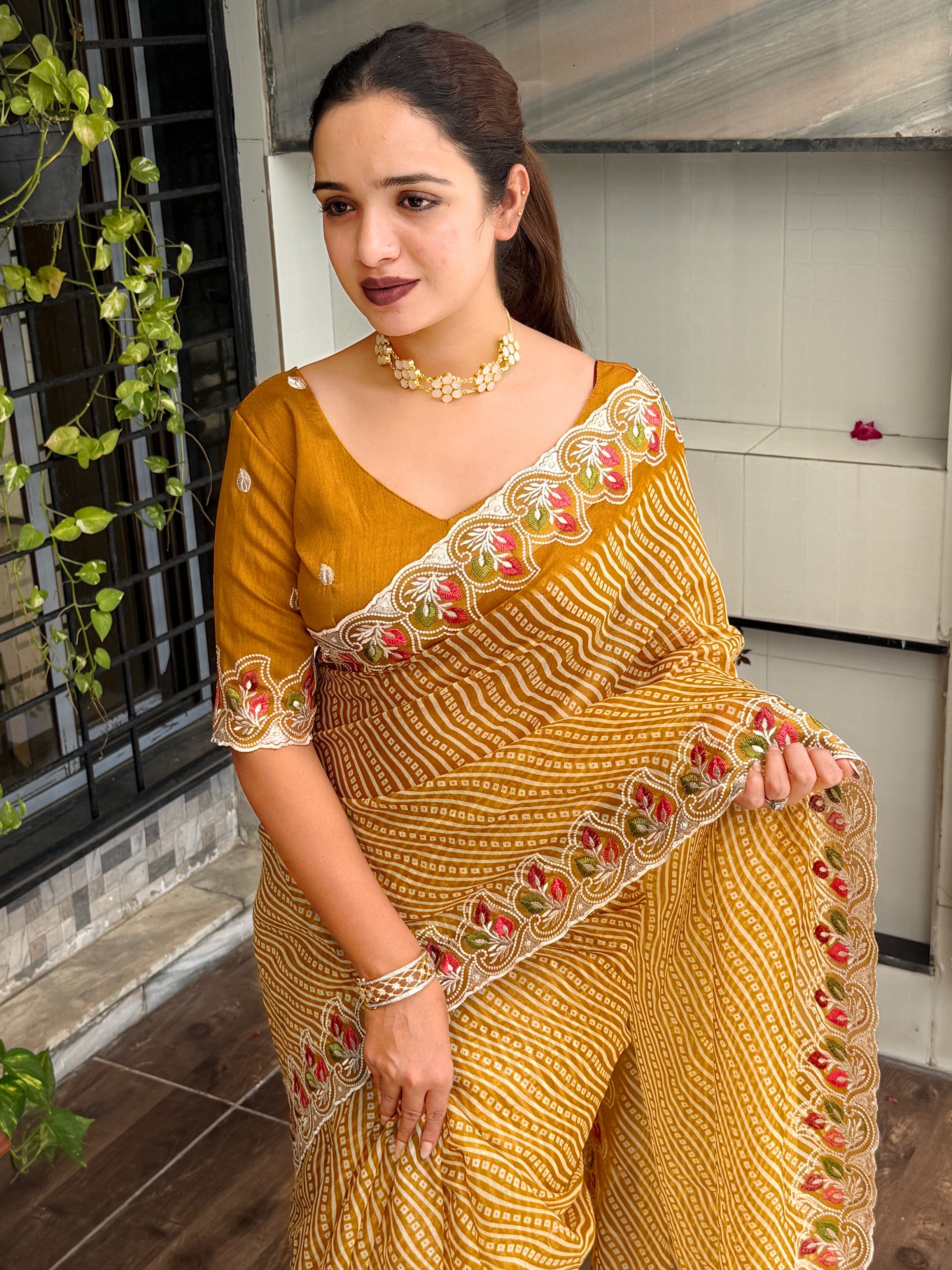 Imaginative Party Wear Cotton Satin Bandhej Print n Embroidered Work With Zari Border Fancy Saree