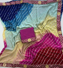 Load image into Gallery viewer, Charming Function Wear Georgette Lehriya Design Lace Border Saree With Blouse Piece
