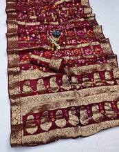 Load image into Gallery viewer, Latest Wedding Wear Hand Bandhej Silk Saree With Zari Weaving Work
