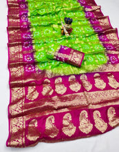 Load image into Gallery viewer, Latest Wedding Wear Hand Bandhej Silk Saree With Zari Weaving Work
