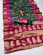 Load image into Gallery viewer, Latest Wedding Wear Hand Bandhej Silk Saree With Zari Weaving Work
