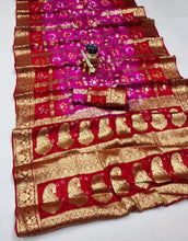 Load image into Gallery viewer, Latest Wedding Wear Hand Bandhej Silk Saree With Zari Weaving Work
