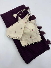 Load image into Gallery viewer, Breathtaking Wine Color Shimmer Nora Weaving Chex Fabric With Tassels Work Saree With Stitched Blouse
