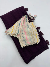 Load image into Gallery viewer, Breathtaking Wine Color Shimmer Nora Weaving Chex Fabric With Tassels Work Saree With Stitched Blouse
