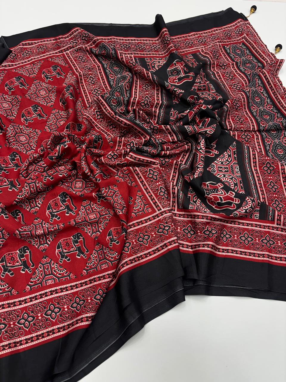 Prettiest Function Wear Pure Satin Silk Ajrak Printed Rich Pallu n Tussles Work Fancy Designer Saree