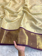 Load image into Gallery viewer, Charming Wedding Wear Light Cream Colour Banarasi Tissue Silk Handstone Work Stunning Pallu n Jacquard Border Saree
