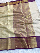 Load image into Gallery viewer, Charming Wedding Wear Light Cream Colour Banarasi Tissue Silk Handstone Work Stunning Pallu n Jacquard Border Saree
