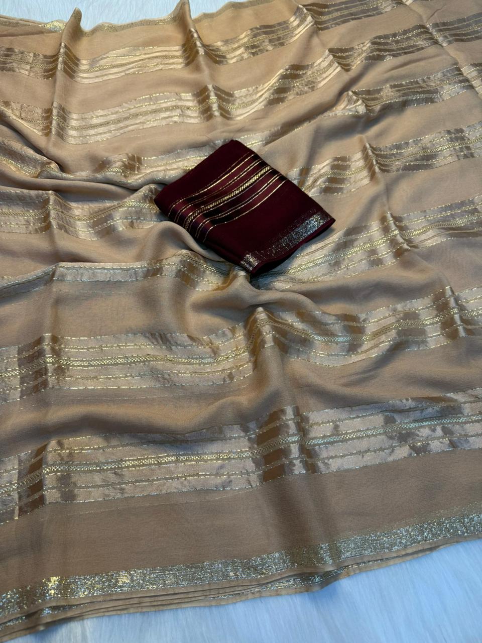 Desirable Party Wear Pure Viscose Georgette Weaving Zari Design Saree With Blouse Piece