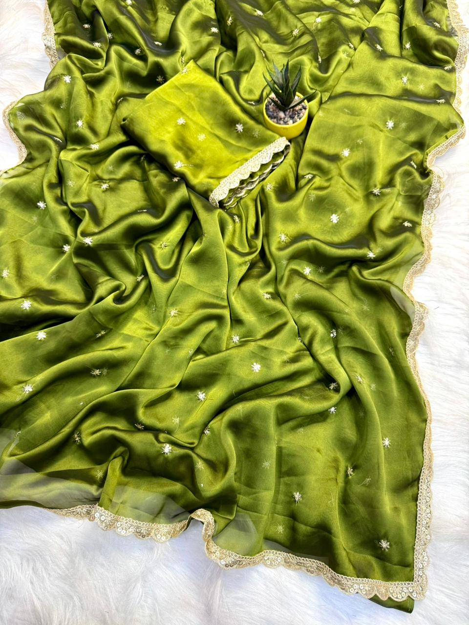 Effervescent Party Wear Pure Soft Rangoli Silk Sequence Work Border Fancy Designer Saree