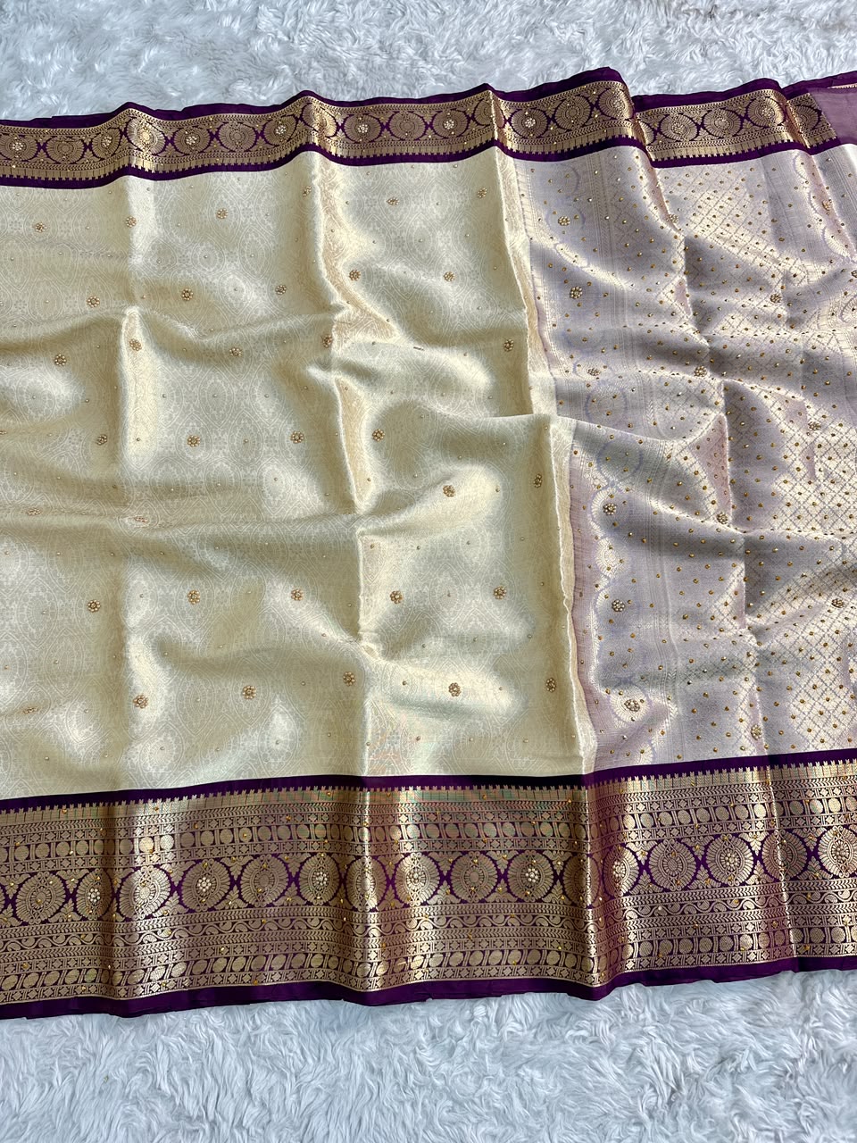 Gratifying Function Wear Light Cream Banarasi Tissue Silk Handstone Work Stunning Pallu n Jacquard Border Saree For Wedding