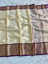 Load image into Gallery viewer, Gratifying Function Wear Light Cream Banarasi Tissue Silk Handstone Work Stunning Pallu n Jacquard Border Saree For Wedding
