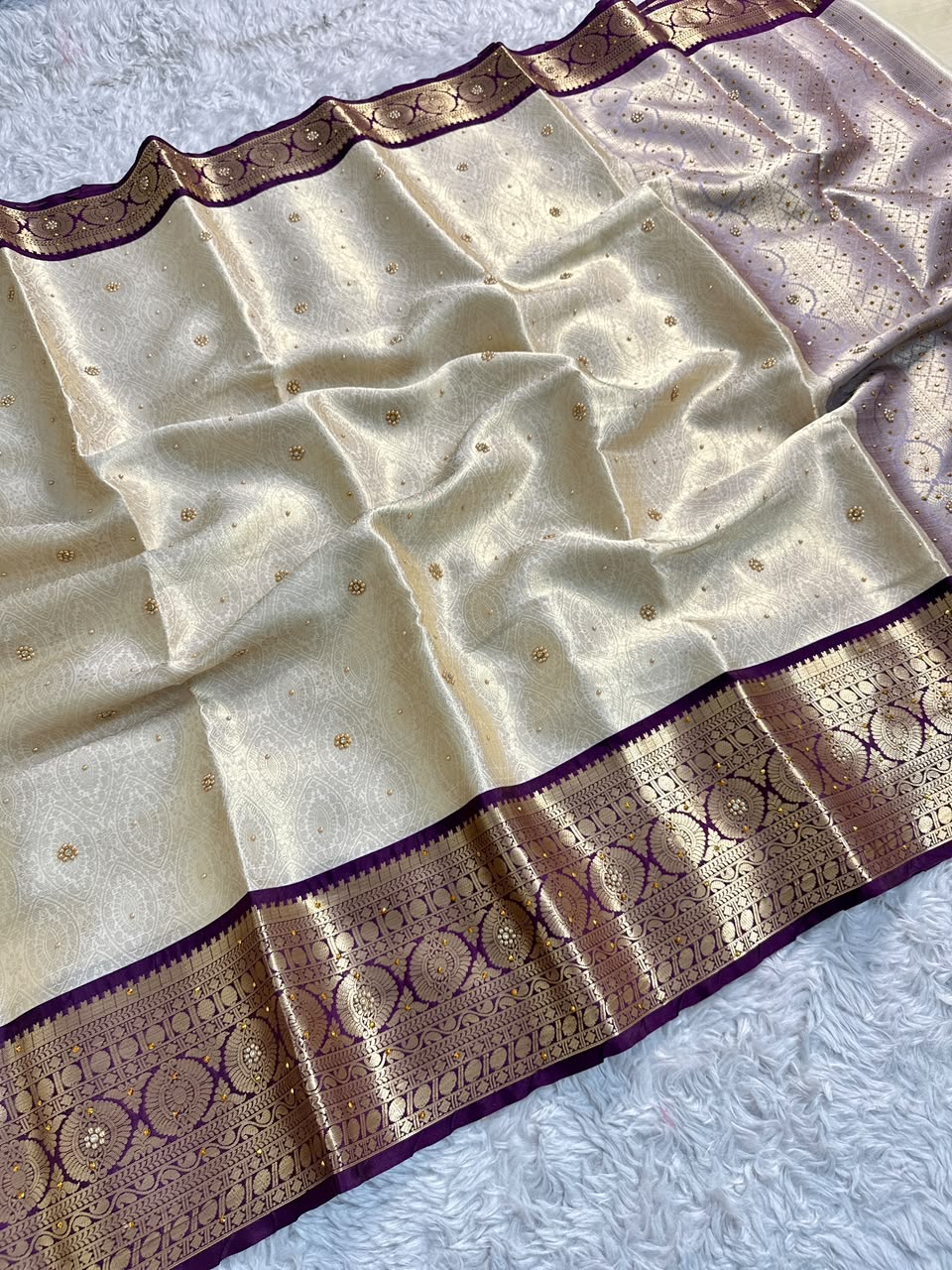 Gratifying Function Wear Light Cream Banarasi Tissue Silk Handstone Work Stunning Pallu n Jacquard Border Saree For Wedding