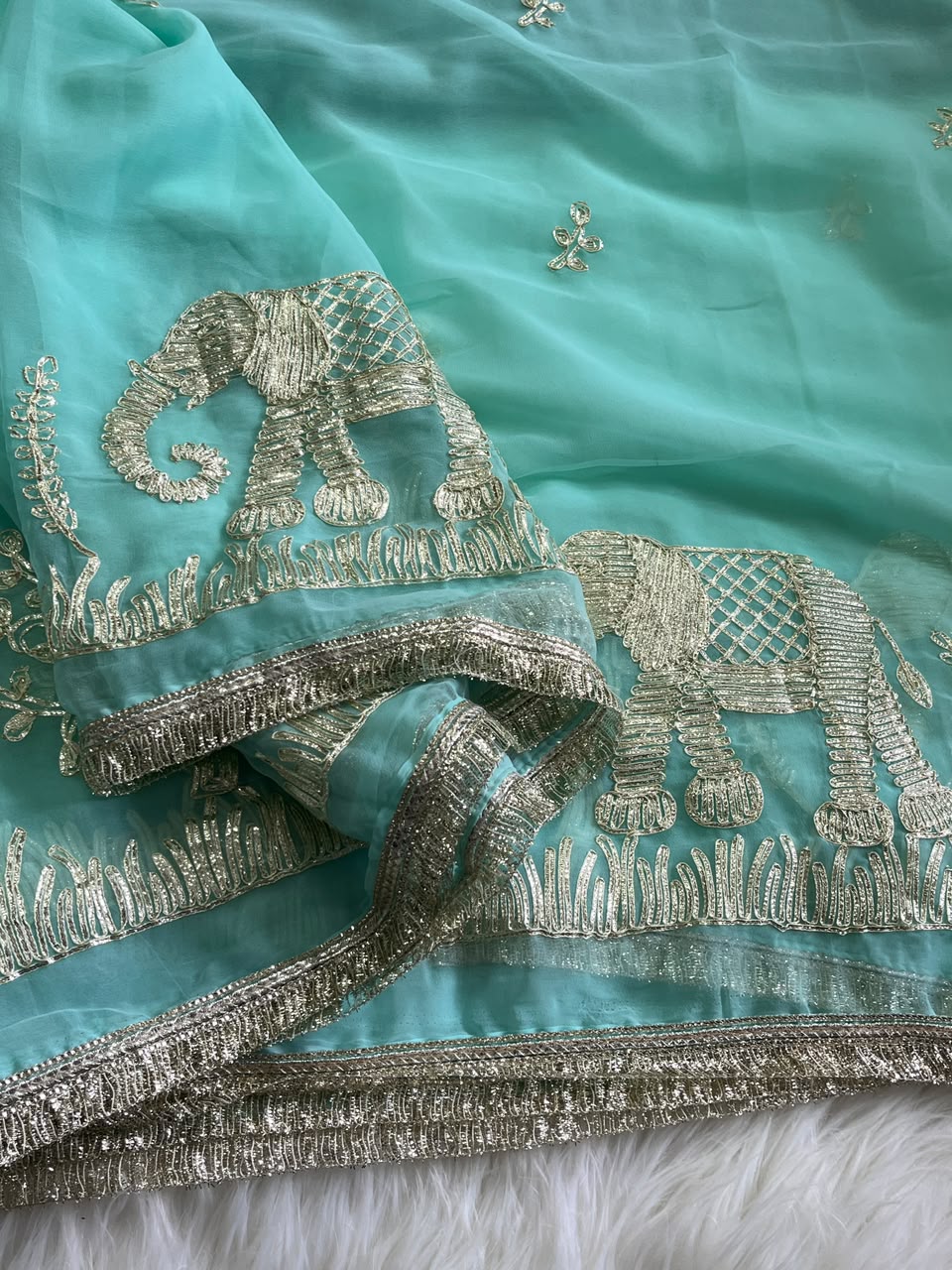 Exuberant Festive Wear Chiffon Silk Embroidery Tussels Work Designer Saree With Blouse Piece