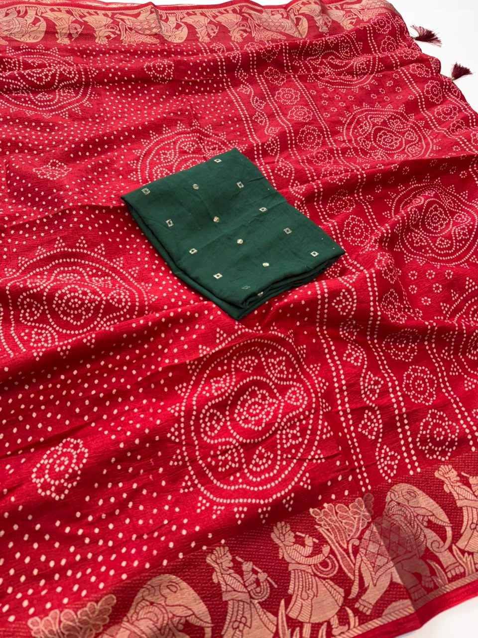 Evocative Festive Wear Dola Silk Bandhani Print Zari Border Fancy Saree With Contrast Blouse Piece