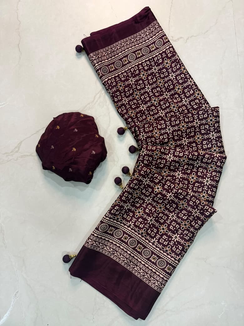 Dazzling Party Wear Crape Silk Ajrak Printed Tussel Work Fancy Saree With Blissful Blouse Piece