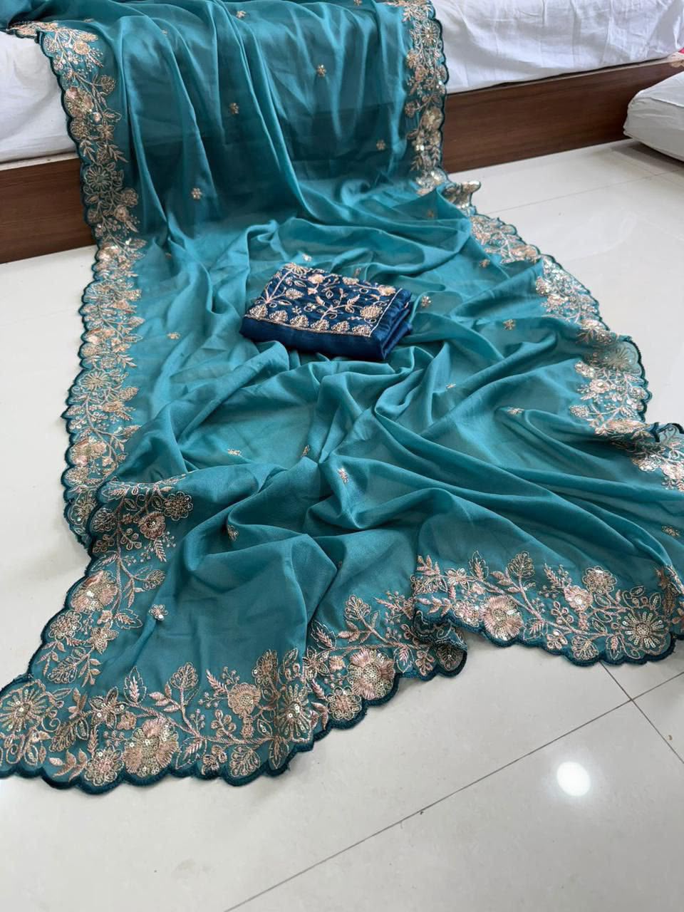 Charming Wedding Wear Georgette Sequence n Arco Border Fancy Saree With Contrast Blouse Piece