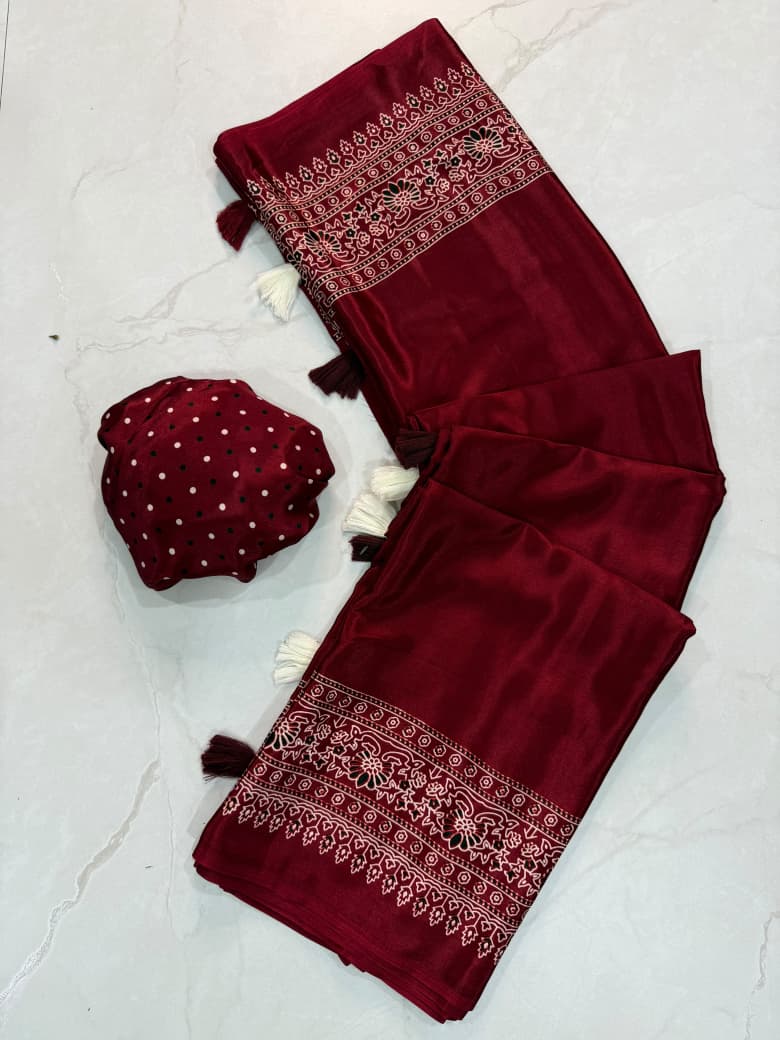 Dazzling Party Wear Silk Ajrak Printed Tussels Work Designer Saree With Blouse Piece