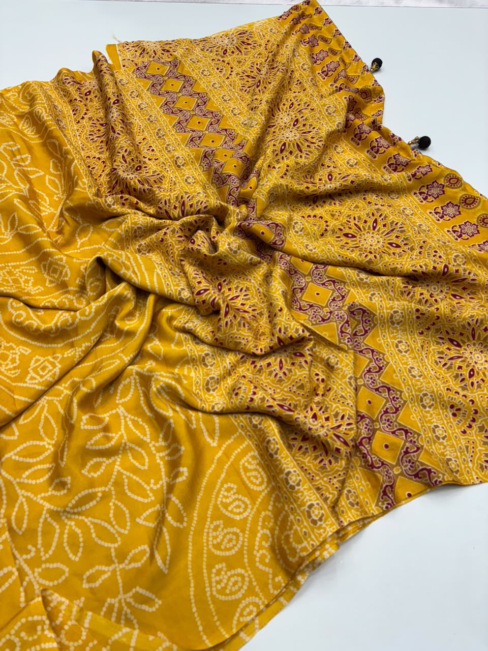 Captivating Function Wear Satin Silk Ajrak Printed Rich Pallu n Tussels Work Fancy Saree With Blouse Piece