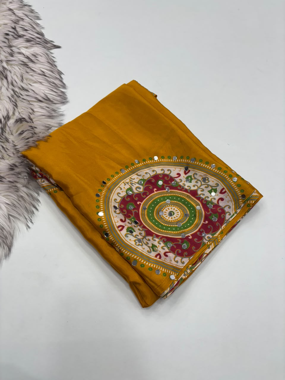 Charming Party Wear Satin Silk Ajrak Print Mirror Work Designer Saree With Blouse Piece