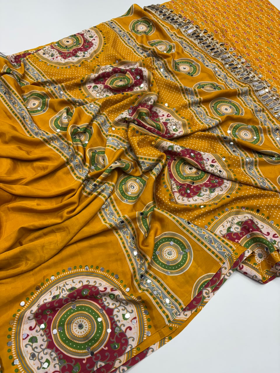 Charming Party Wear Satin Silk Ajrak Print Mirror Work Designer Saree With Blouse Piece