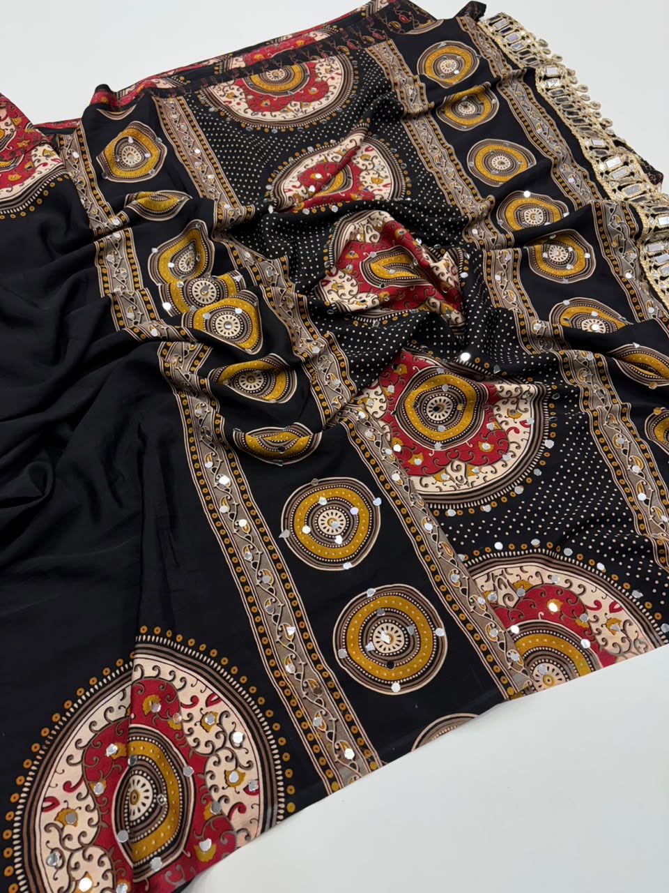 Charming Party Wear Satin Silk Ajrak Print Mirror Work Designer Saree With Blouse Piece