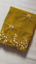 Load and play video in Gallery viewer, Partywear Georgette Mustard Color Embroidered Border Work Fancy Designer Saree With Blouse
