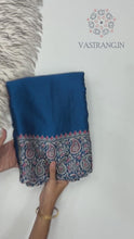 Load and play video in Gallery viewer, New Function Wear Blue Color Pure Satin Silk Ajrak Printed Rich Pallu n Tussles Work Fancy Designer Saree
