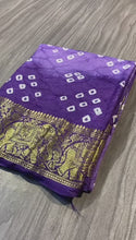 Load and play video in Gallery viewer, New Beautiful Wedding Wear Soft Bandhani Silk Saree With Print n Jacquard Woven work
