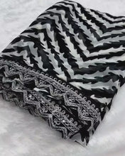 Load and play video in Gallery viewer, New Soft Georgette Print With Cut Lace Work Fancy Designer Saree With Blouse Piece
