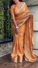 Load and play video in Gallery viewer, Classic Party Wear Muslin Cotton Zari Jacquard Border With Sequence Weaving Pearl lace in Saree Design
