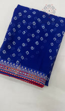 Load and play video in Gallery viewer, New Blue Color Georgette Print n Sequence Lace Border Work Fancy Designer Wedding Wear Saree
