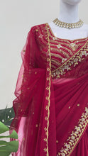 Load and play video in Gallery viewer, New Festive Wear Gorgeous Red Color Faux Georgette Embroidery Work Fancy Designer Saree With Unstitched Blouse
