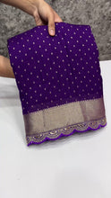Load and play video in Gallery viewer, New Wedding wear Purple Color Georgette Gold Zari Weaving With Rich Weaving Pallu n Lace Work Fancy Designer Saree
