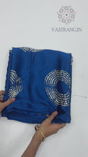 Load and play video in Gallery viewer, New Wedding Wear Pure Satin Silk Ajrak Printed Rich Pallu n Tussles Work Fancy Designer Saree
