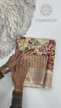 Load and play video in Gallery viewer, New Wedding Wear Cream Color Zari Weaving n Tussles Work Fancy Designer Saree With Rich Pallu
