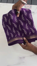 Load and play video in Gallery viewer, Luxuriant Purple Printed Georgette Tissue Saree With Fugacious Blouse Piece
